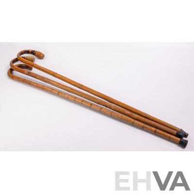 Collection Thee Hand Carved Asian Bamboo Walking Sticks Including Example with Demon Motif Detail