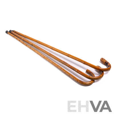 Collection Thee Hand Carved Asian Bamboo Walking Sticks Including Example with Demon Motif Detail
