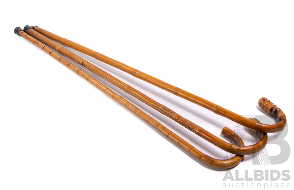 Collection Thee Hand Carved Asian Bamboo Walking Sticks Including Example with Demon Motif Detail