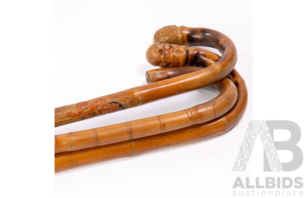 Collection Thee Hand Carved Asian Bamboo Walking Sticks Including Example with Demon Motif Detail