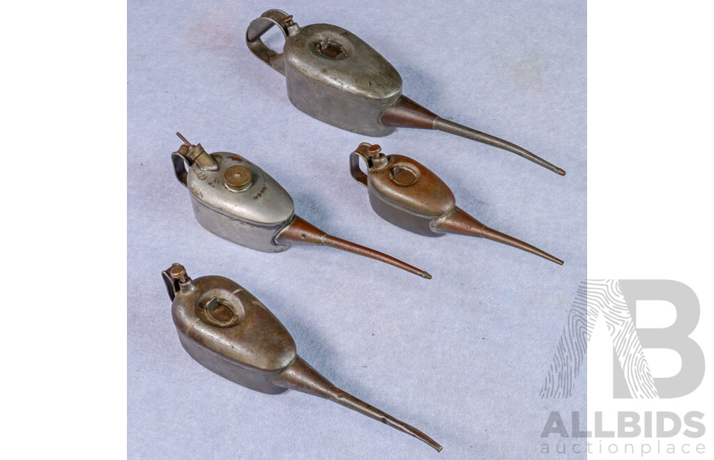 Collection of Four Vintage Metal Graduated Oil Cans