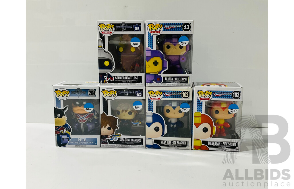 Collection of six Funko Pop Vinyl Figures From Kingdom Hearts and Megaman and More in Original Packaging