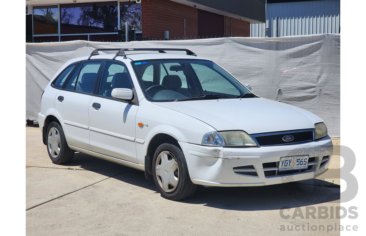 8/2001 Ford Laser LXi KN 5d Hatchback White 1.6L