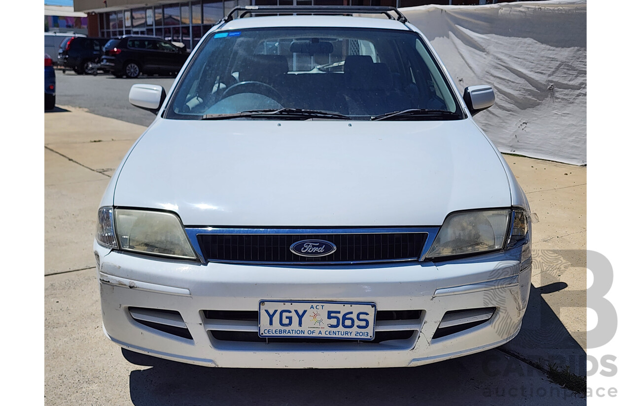 8/2001 Ford Laser LXi KN 5d Hatchback White 1.6L