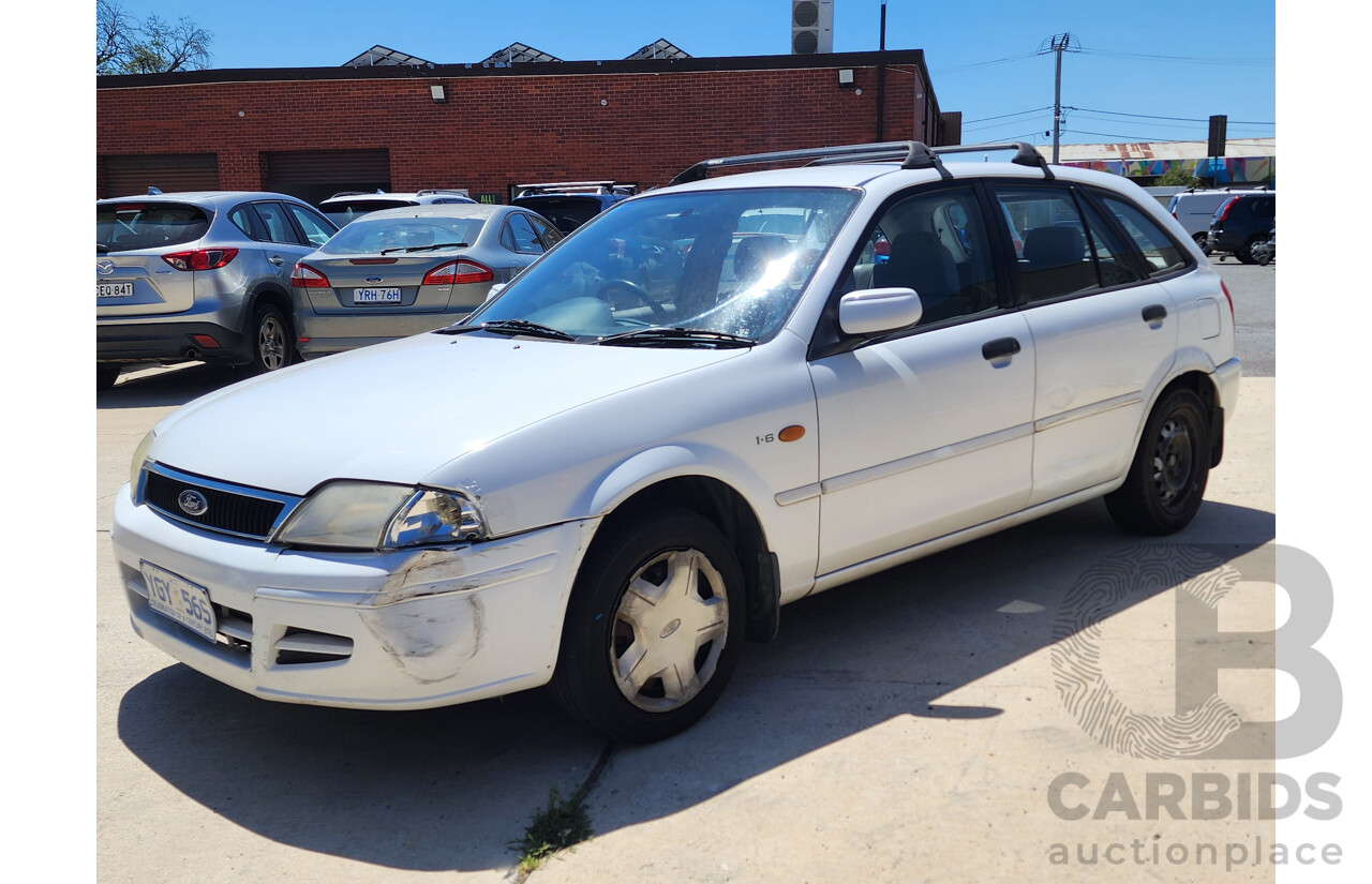 8/2001 Ford Laser LXi KN 5d Hatchback White 1.6L