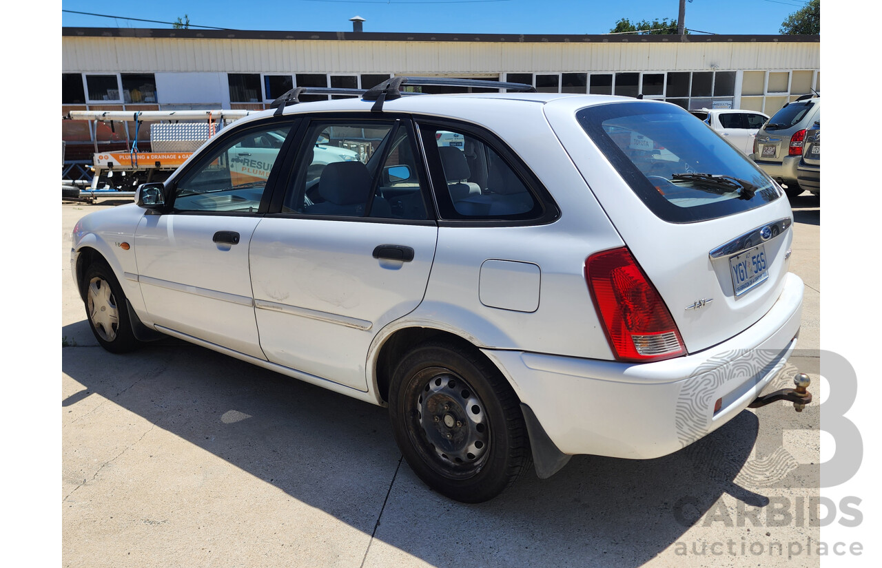 8/2001 Ford Laser LXi KN 5d Hatchback White 1.6L