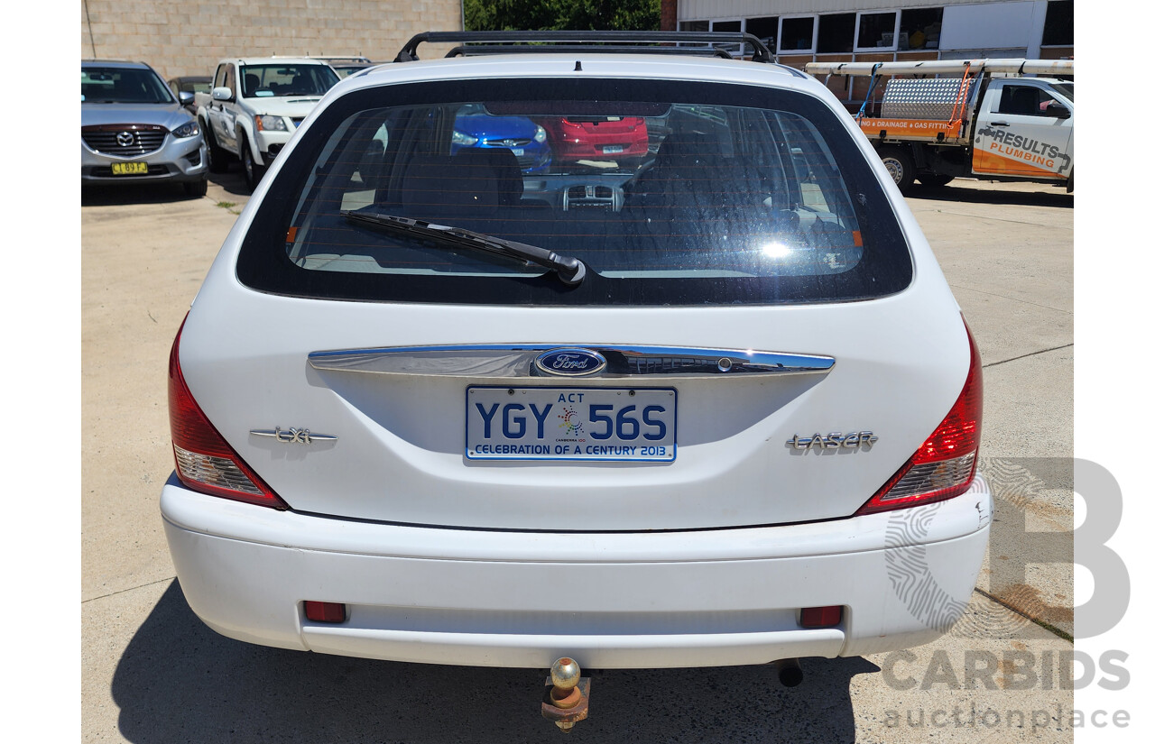 8/2001 Ford Laser LXi KN 5d Hatchback White 1.6L