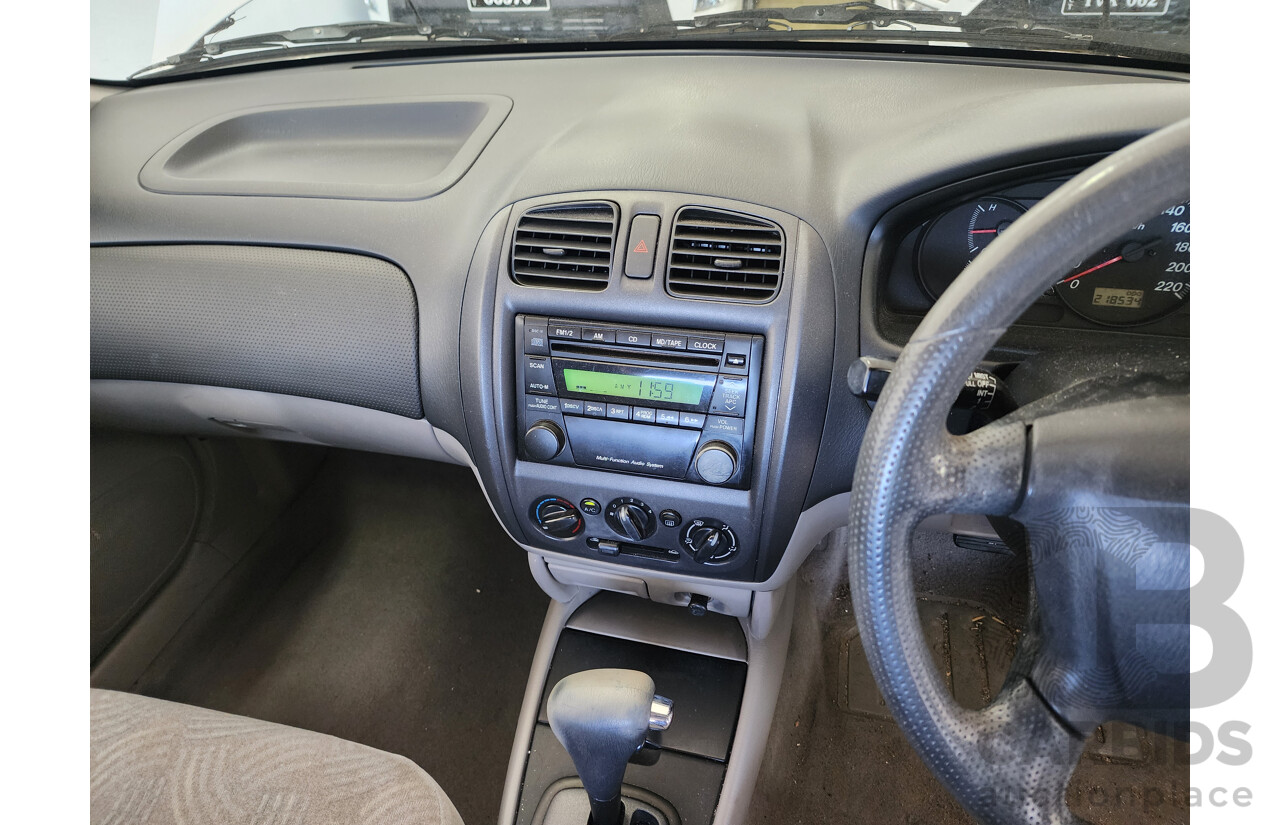 8/2001 Ford Laser LXi KN 5d Hatchback White 1.6L