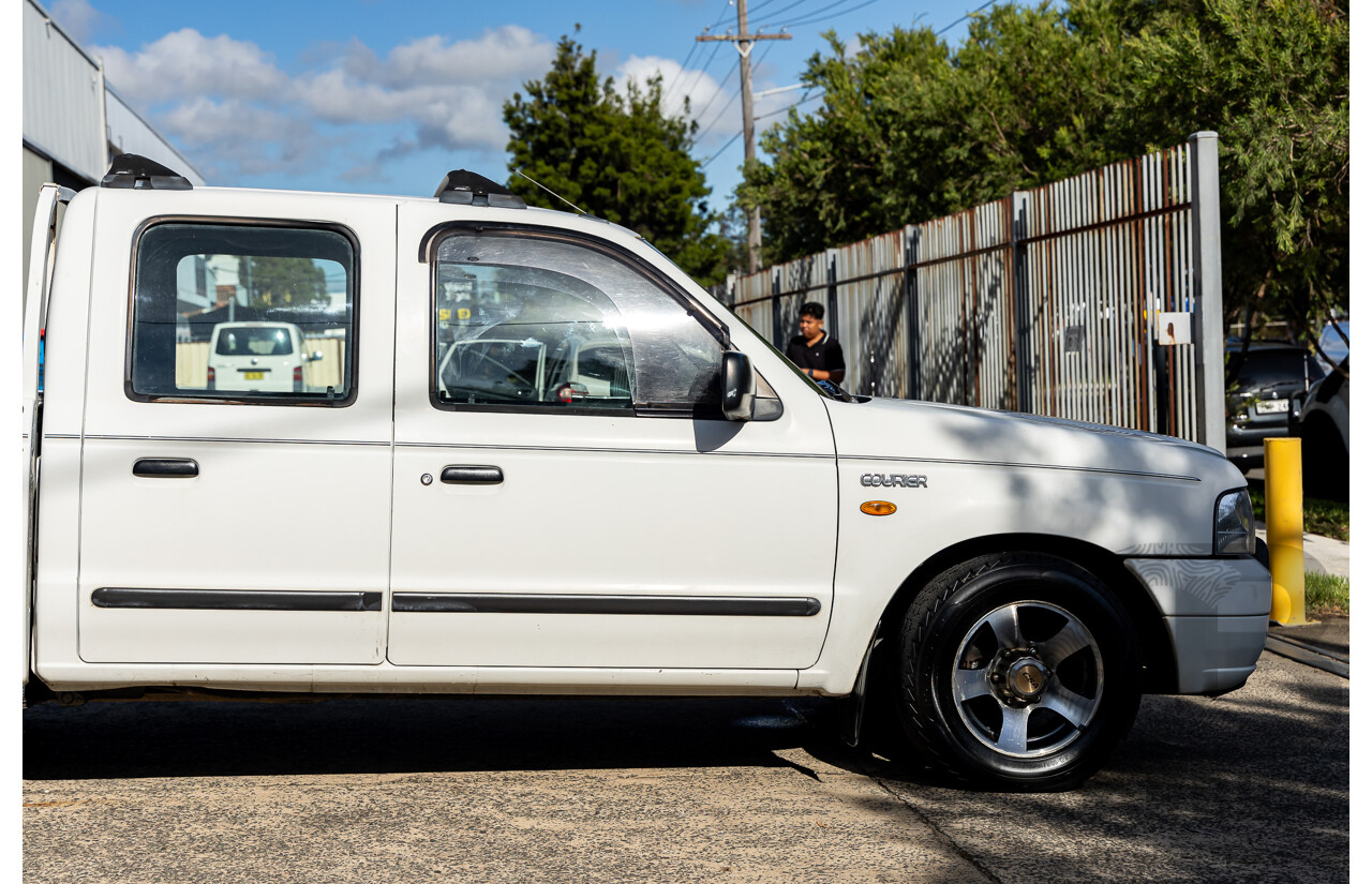 1/2004 Ford Courier XL (4x2) PG Crew Cab P/Up Cool White 2.6L