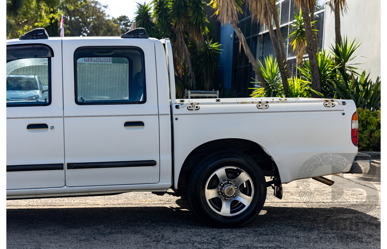 1/2004 Ford Courier XL (4x2) PG Crew Cab P/Up Cool White 2.6L