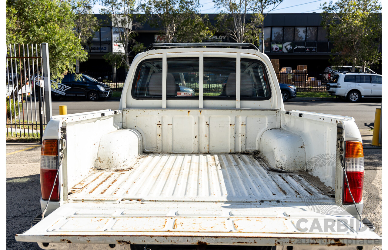 1/2004 Ford Courier XL (4x2) PG Crew Cab P/Up Cool White 2.6L