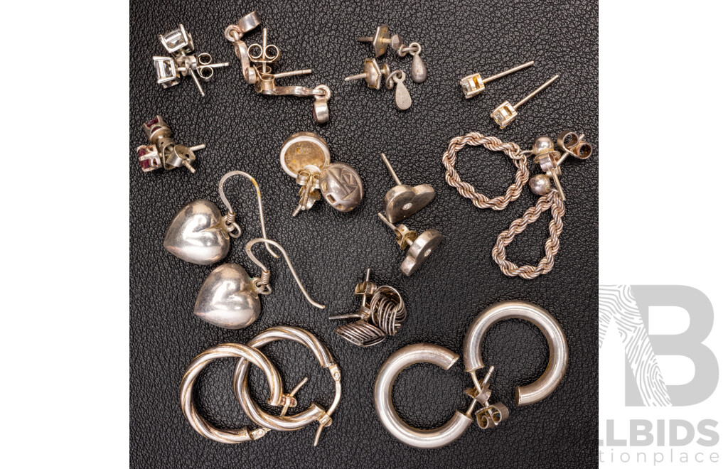 Collection of (12) Pairs of Sterling Silver Earrings Including Studs, Drops & Hoops, 25.48 Grams