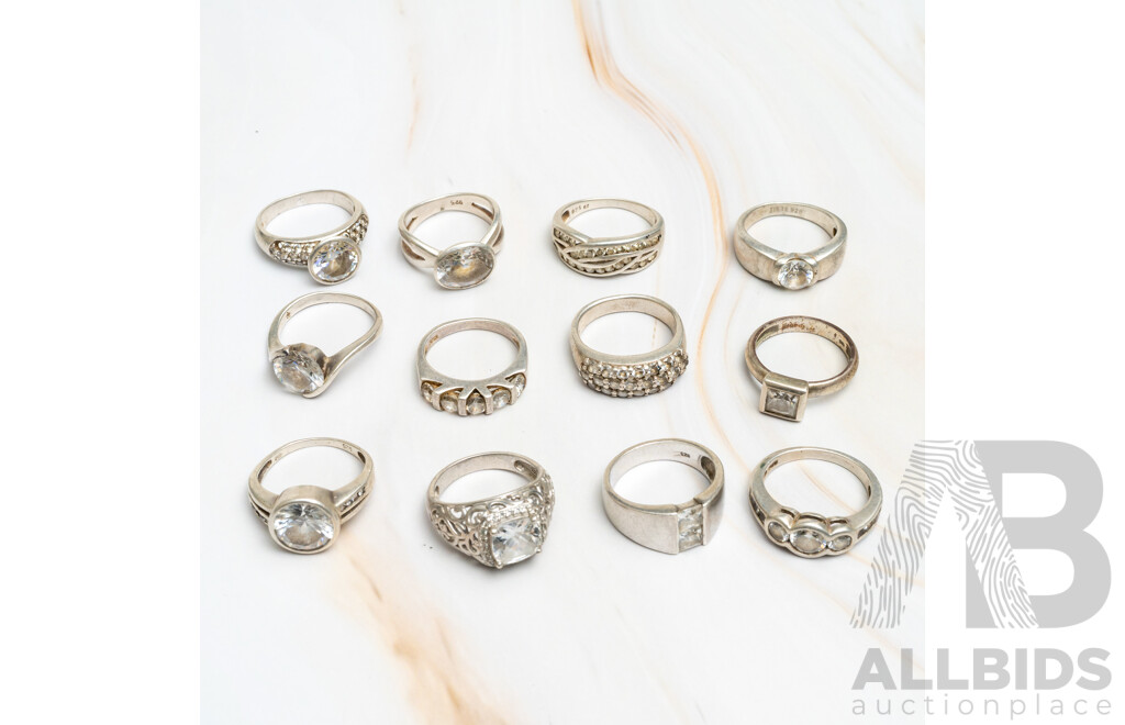 Collection of (12) Sterling Silver Cubic Zirconia Set Rings in Various Styles, Sizes L-P, 53.0 Grams