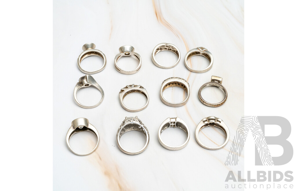 Collection of (12) Sterling Silver Cubic Zirconia Set Rings in Various Styles, Sizes L-P, 53.0 Grams