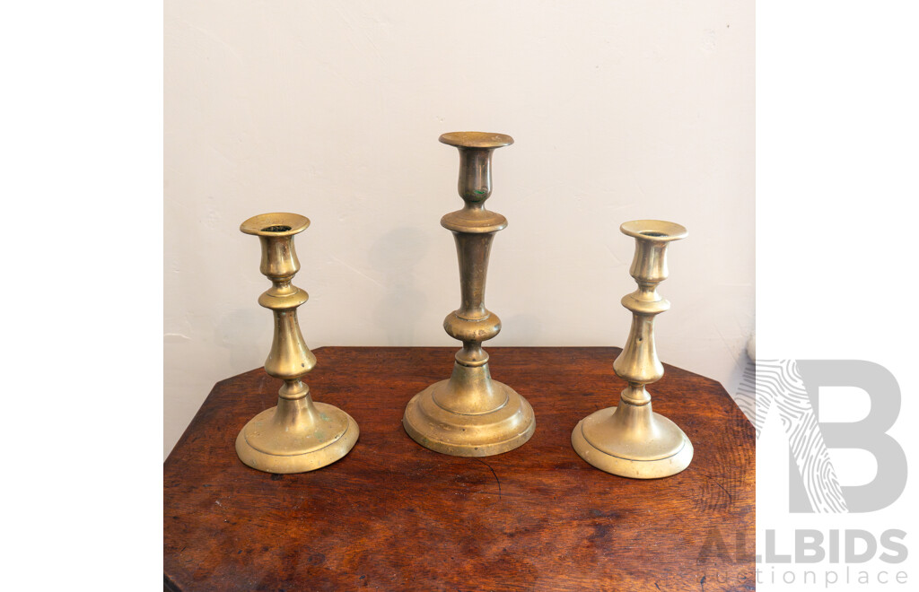 Set of Three Georgian Brass Graduated Candlesticks