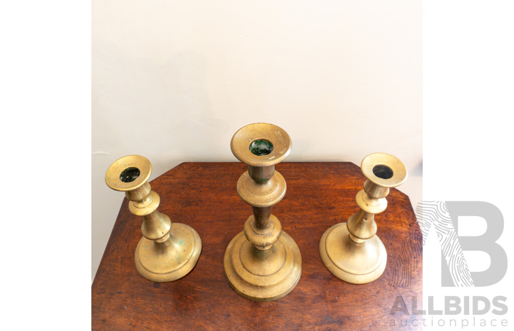 Set of Three Georgian Brass Graduated Candlesticks