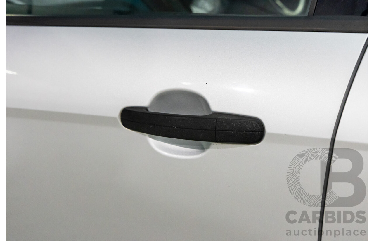 7/2012 Ford Focus Ambiente LW 5d Hatchback Ingot Silver Metallic 1.6L