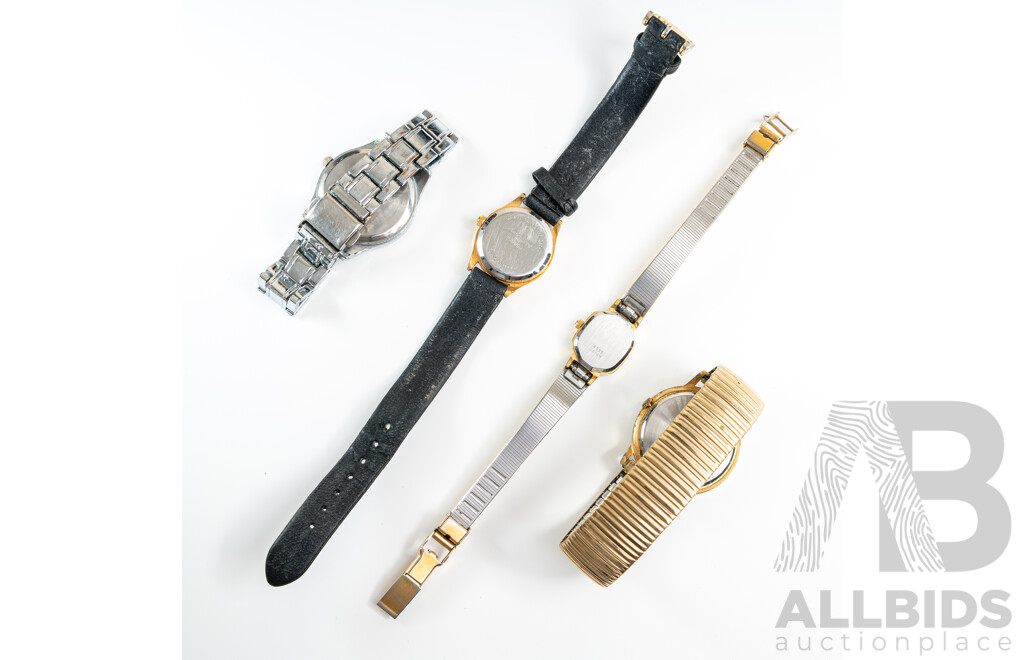 Collection of (4) Vintage Ladies Dress Watches Including Gold Tone Pierre Cardin Diamond Collection Watch 4535