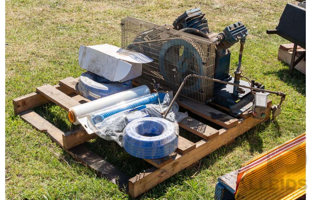 Pallet Containing Ingersoll Rand Air Compressor & Various Sized Hoses to Suit