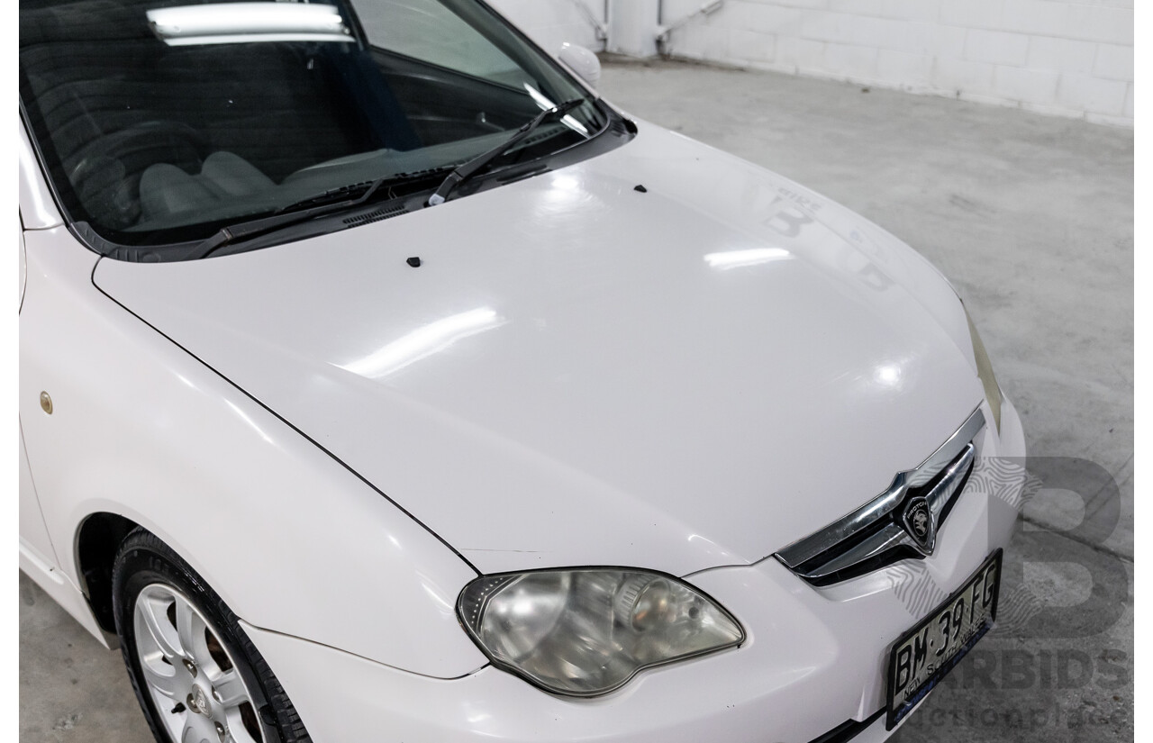 2/2010 Proton Persona GX  4d Sedan Solid White 1.6L