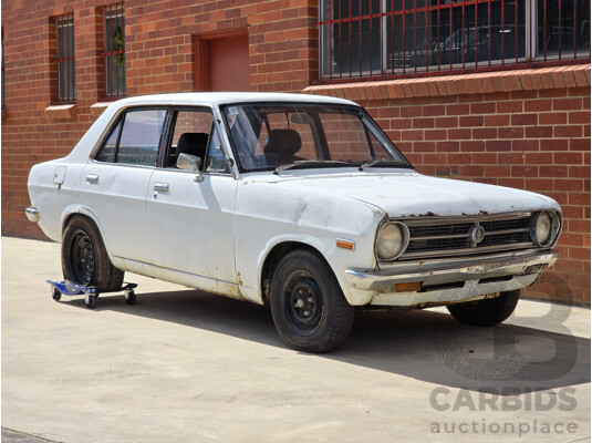 7/1970 Datsun 1200 Standard B110 4d Sedan White 1.2L