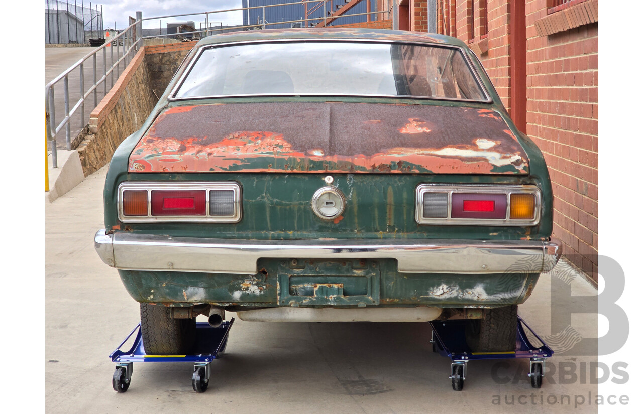 9/1973 Datsun 1200 Deluxe B110 2d Coupe Green 1.2L