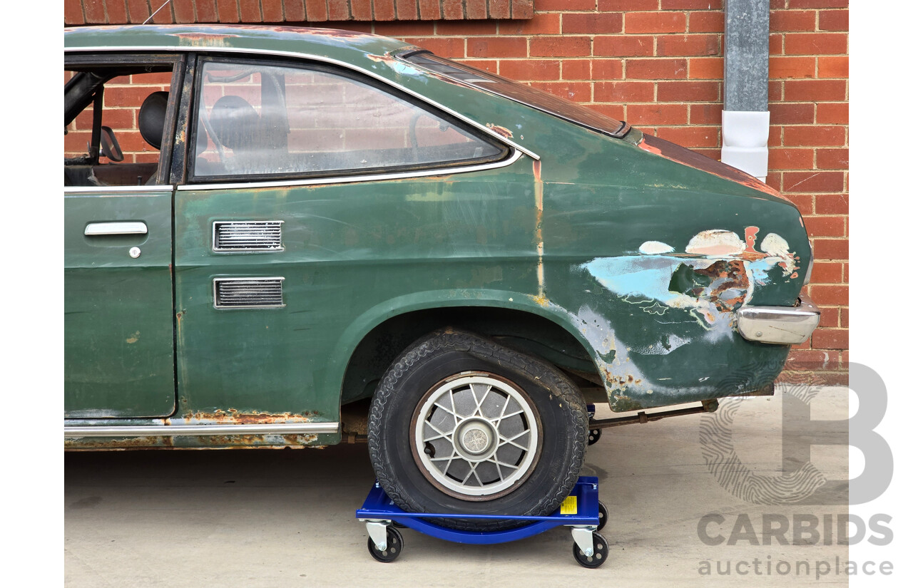 9/1973 Datsun 1200 Deluxe B110 2d Coupe Green 1.2L