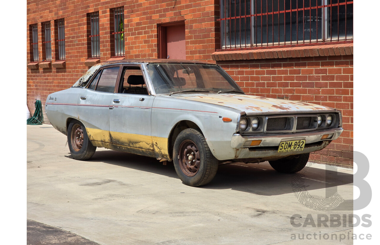 8/1976 Datsun 240k GL HGC110 4d Sedan Black / Silver Metallic 2.4L