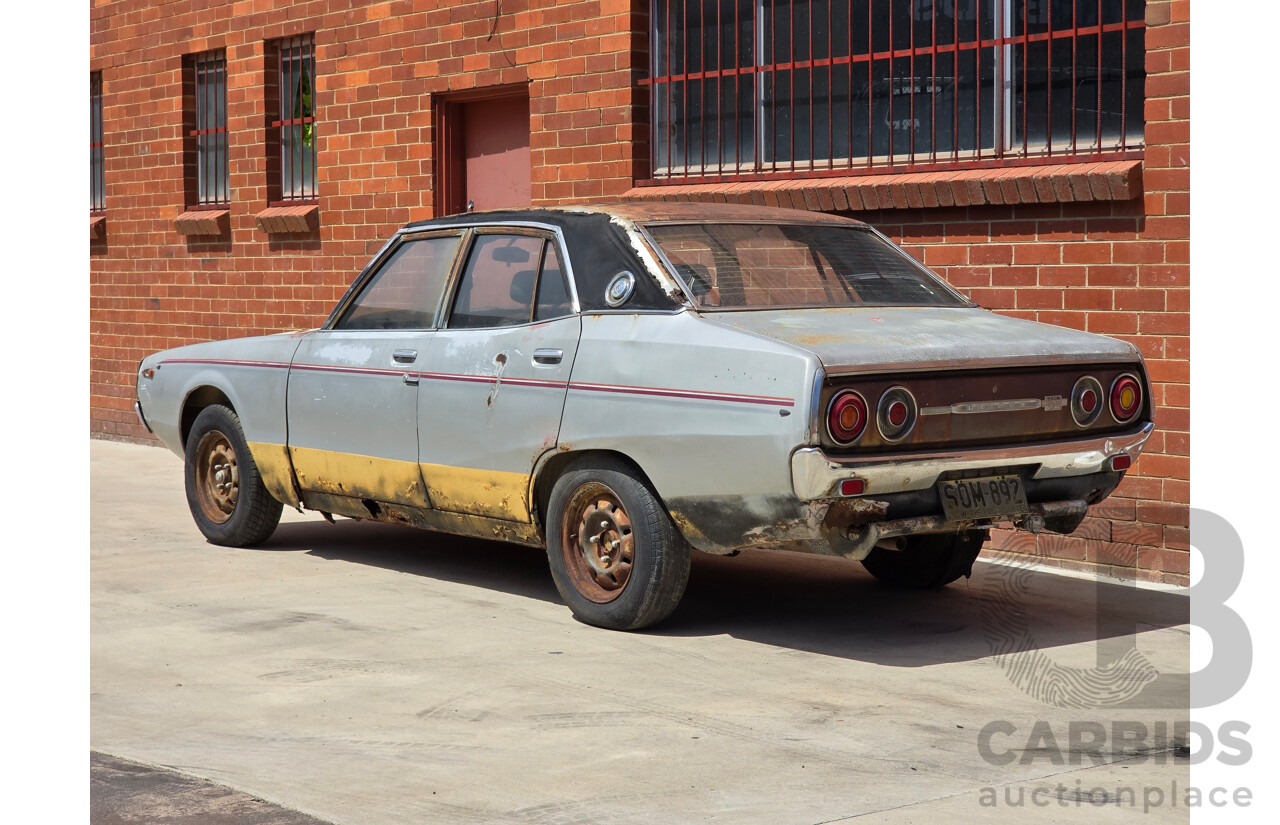 8/1976 Datsun 240k GL HGC110 4d Sedan Black / Silver Metallic 2.4L