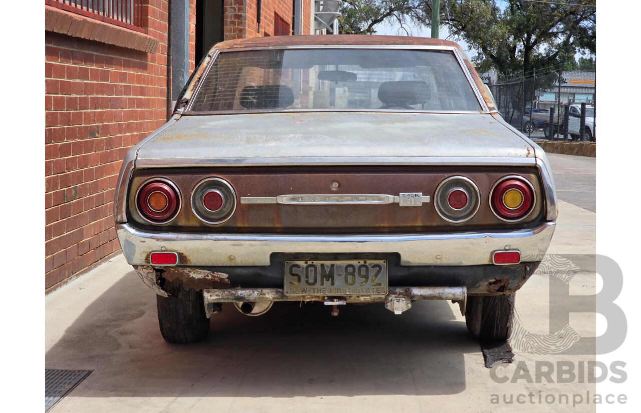 8/1976 Datsun 240k GL HGC110 4d Sedan Black / Silver Metallic 2.4L