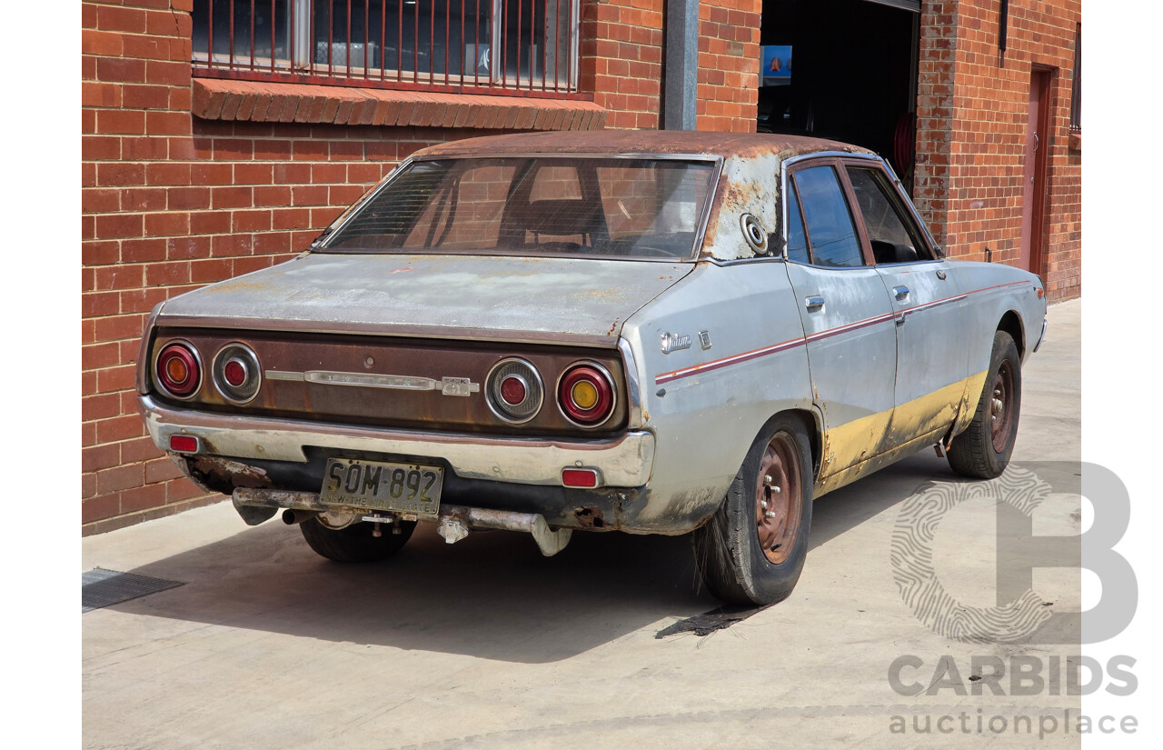 8/1976 Datsun 240k GL HGC110 4d Sedan Black / Silver Metallic 2.4L