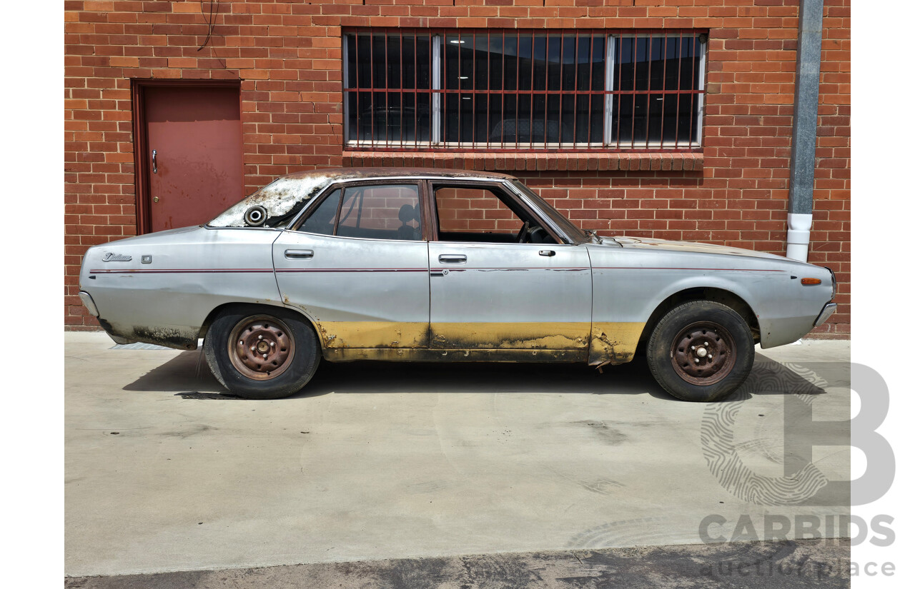 8/1976 Datsun 240k GL HGC110 4d Sedan Black / Silver Metallic 2.4L