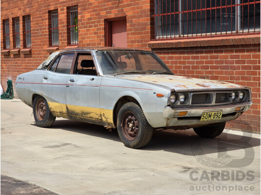 8/1976 Datsun 240k GL HGC110 4d Sedan Black / Silver Metallic 2.4L