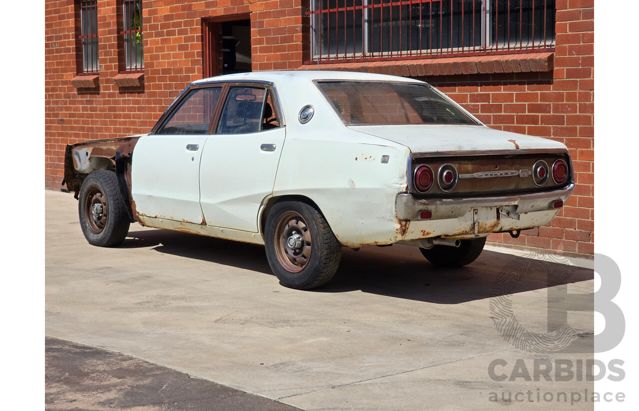 5/1977 Datsun 240k GL HGC110 4d Sedan White 2.4L