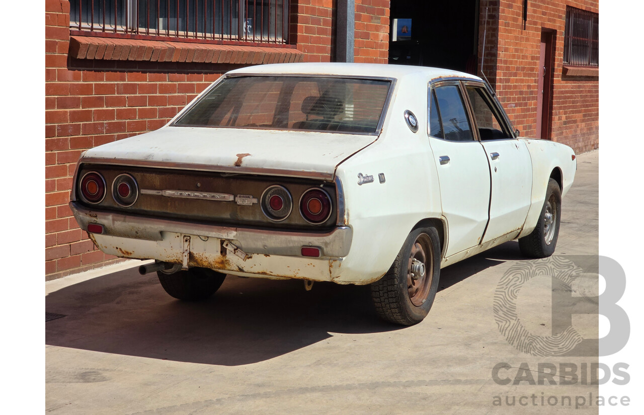 5/1977 Datsun 240k GL HGC110 4d Sedan White 2.4L