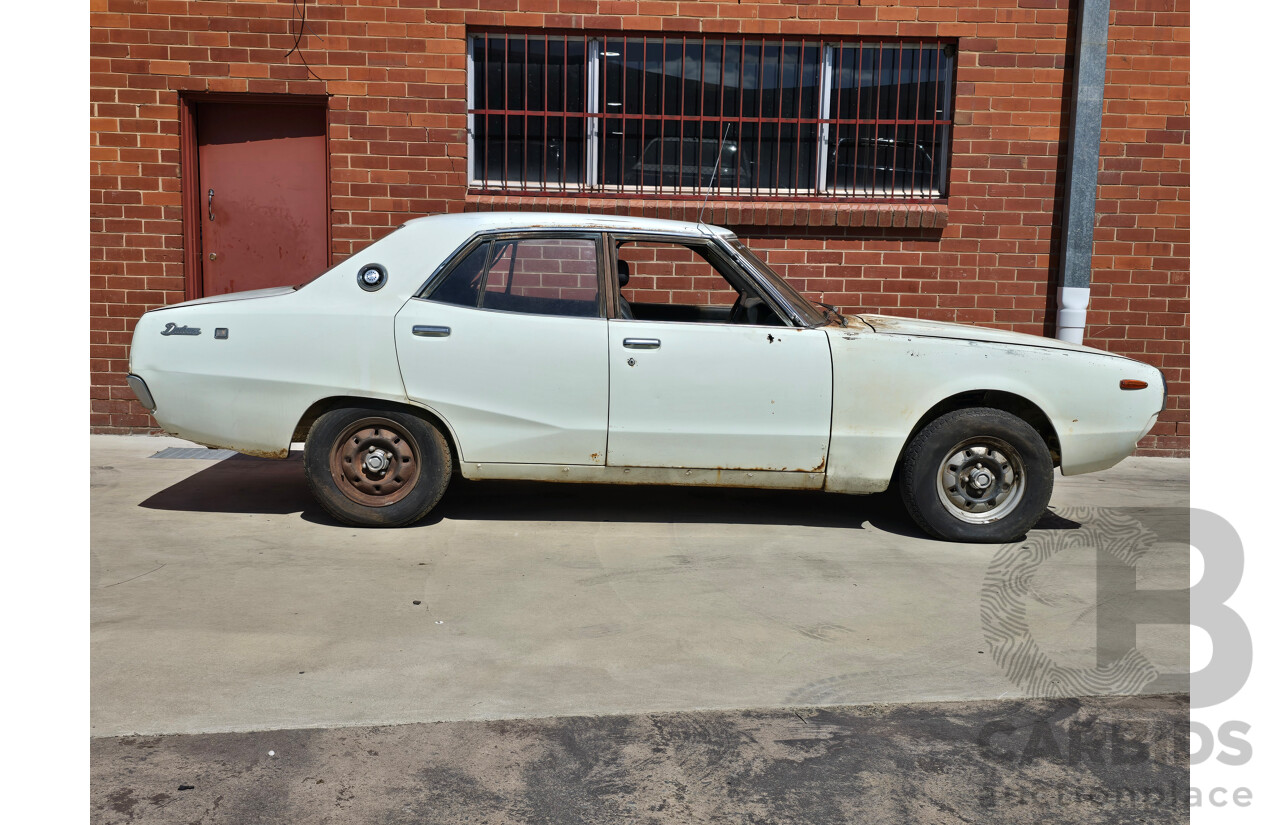 5/1977 Datsun 240k GL HGC110 4d Sedan White 2.4L