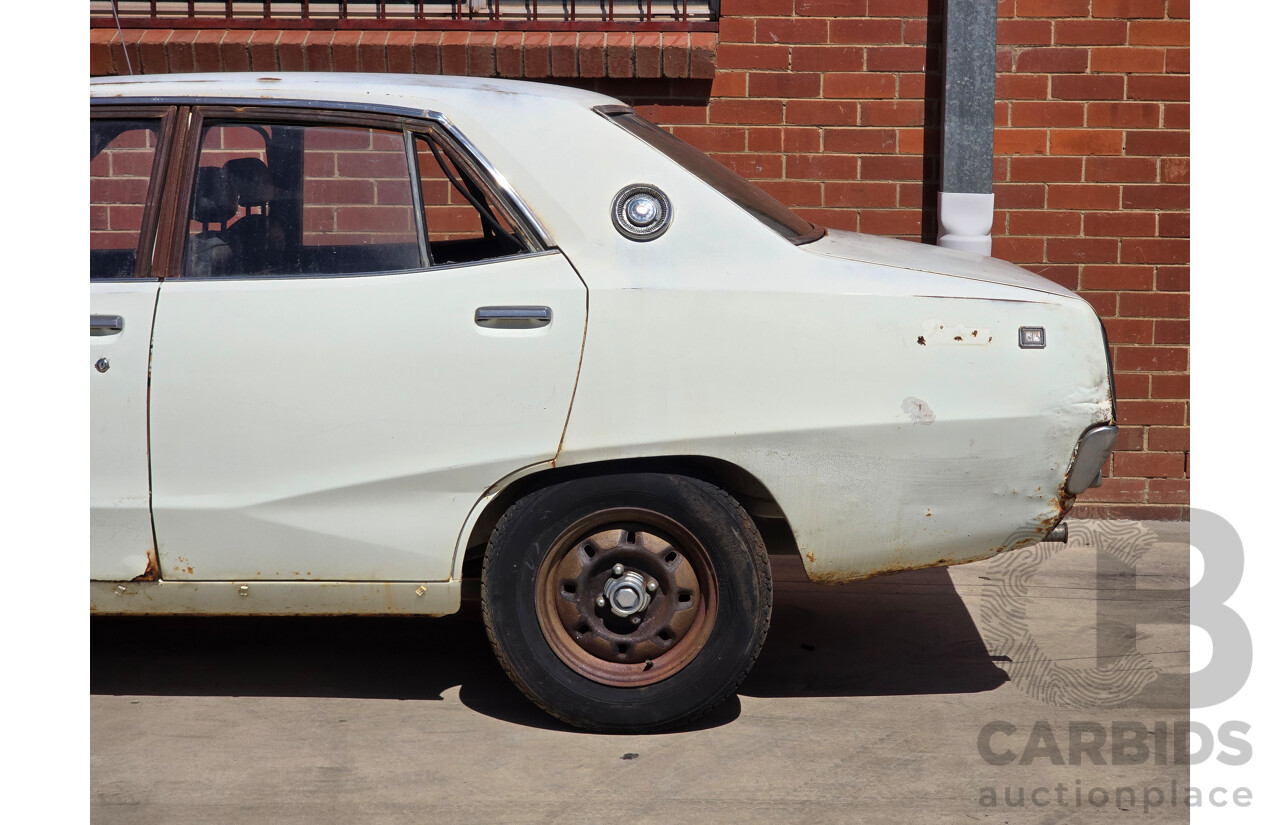 5/1977 Datsun 240k GL HGC110 4d Sedan White 2.4L