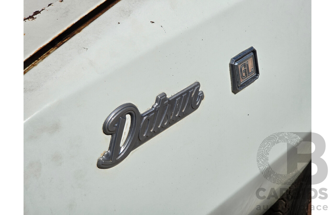 5/1977 Datsun 240k GL HGC110 4d Sedan White 2.4L