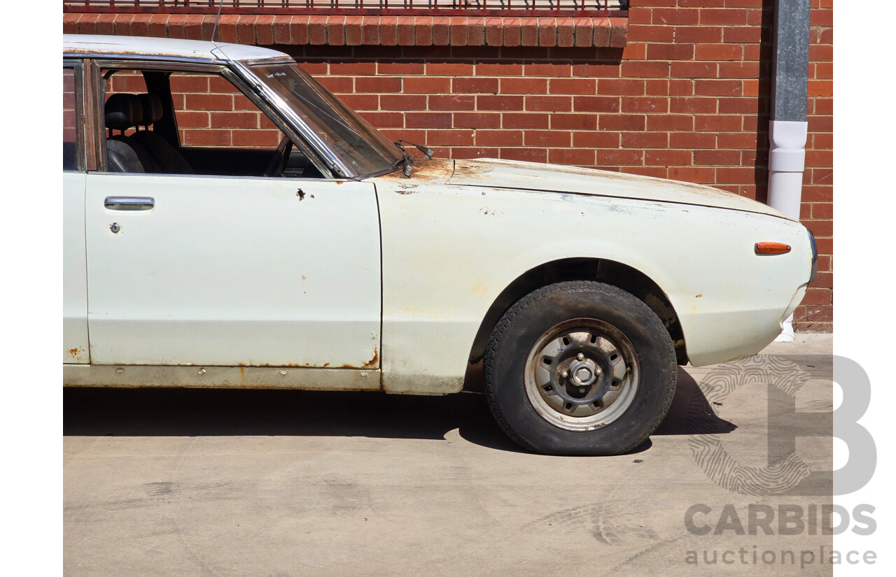 5/1977 Datsun 240k GL HGC110 4d Sedan White 2.4L