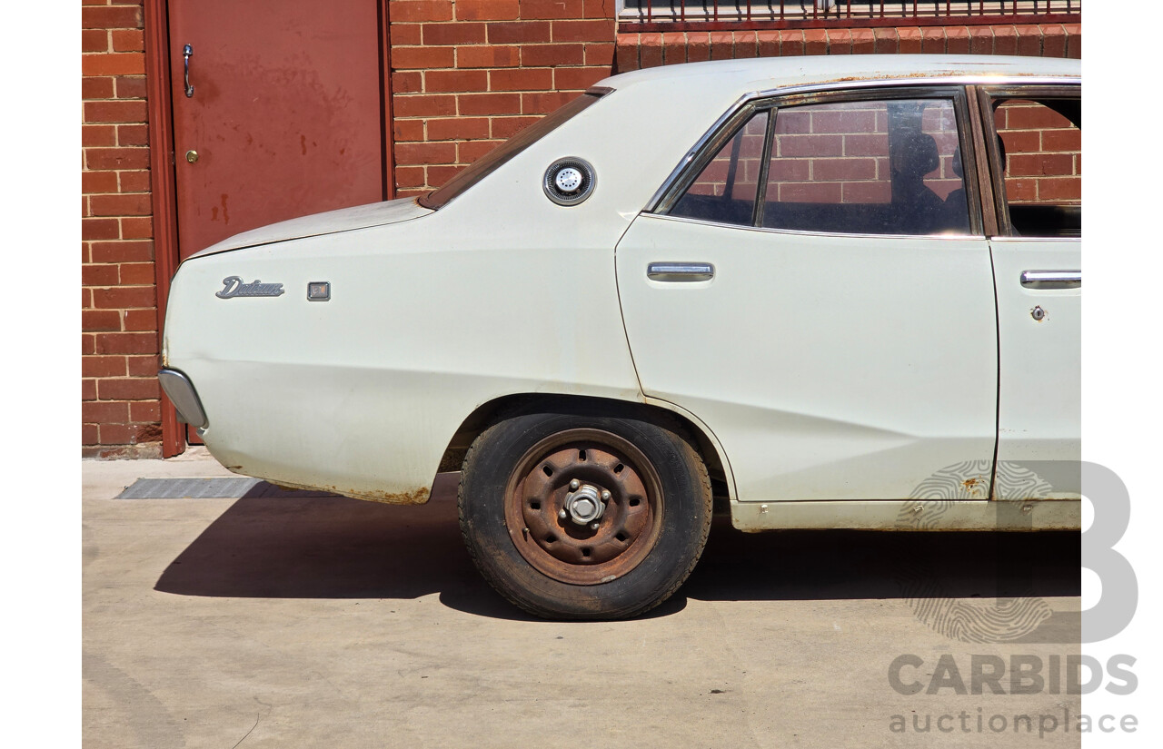 5/1977 Datsun 240k GL HGC110 4d Sedan White 2.4L