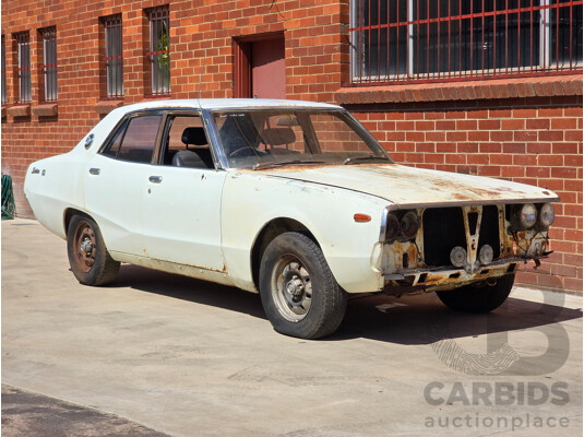 5/1977 Datsun 240k GL HGC110 4d Sedan White 2.4L