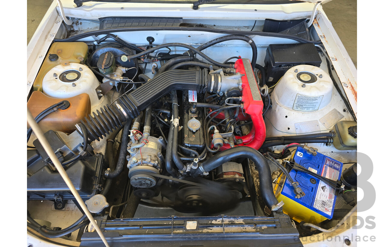 7/1984 Holden VK Commodore SL 4d Sedan Alpine White 3.3L