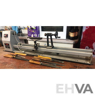 Ryobi 1000mm Wood Turning Lathe with Tools and Oxfrod Mobile Medical Bed with Benchtop