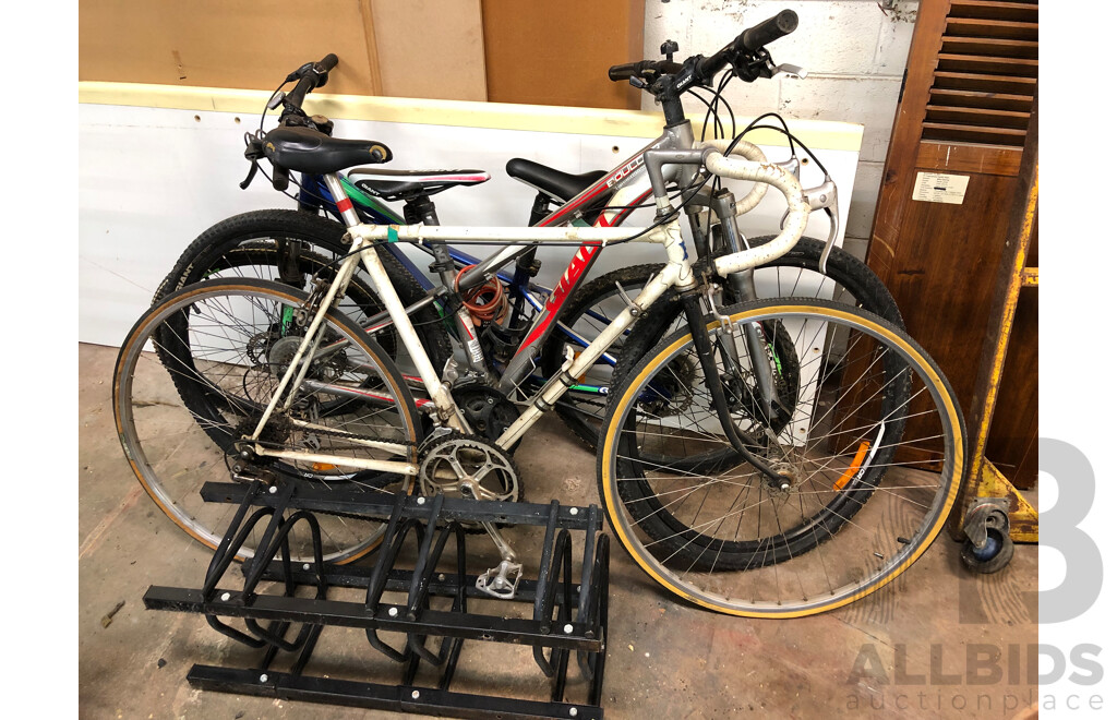 Three Bikes and Two Bike Racks