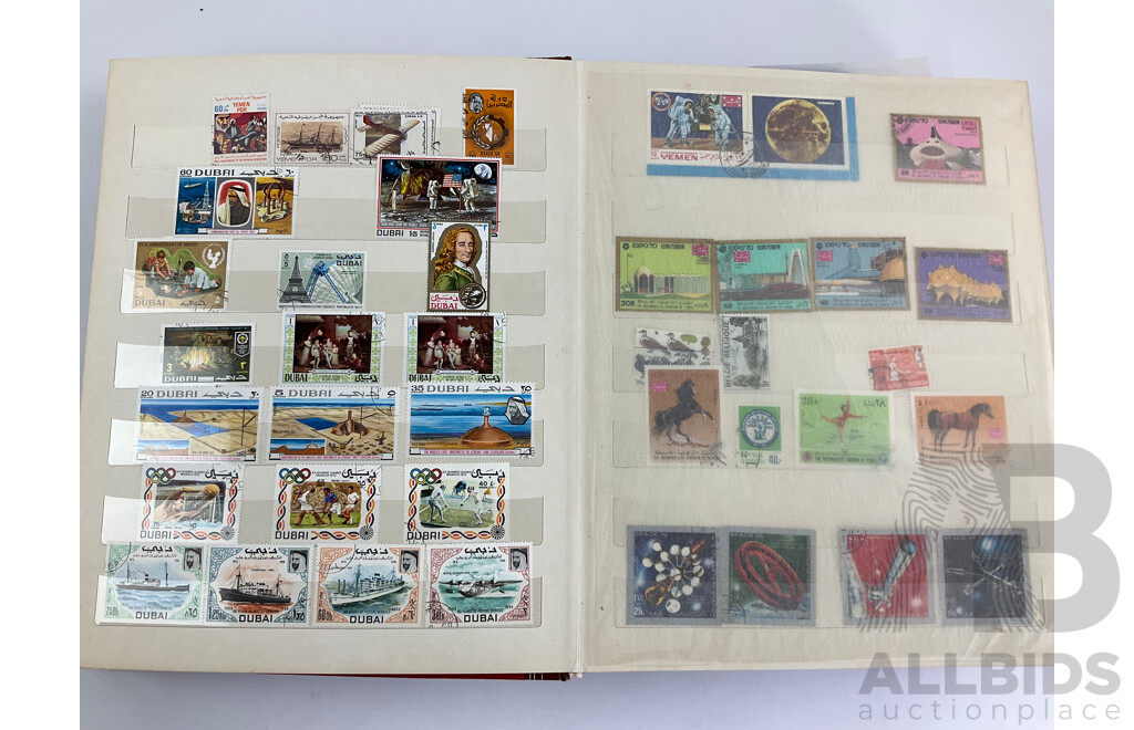 Two Albums of Vintage Stamps Including New Zealand, Dubai, Mongolia, Poland, Cocos Islands, Zimbabwe, Singapore, Canada, Yugoslavia, USA, Netherlands, UK, Fiji, France, PNG, Grenada, Isle of Men