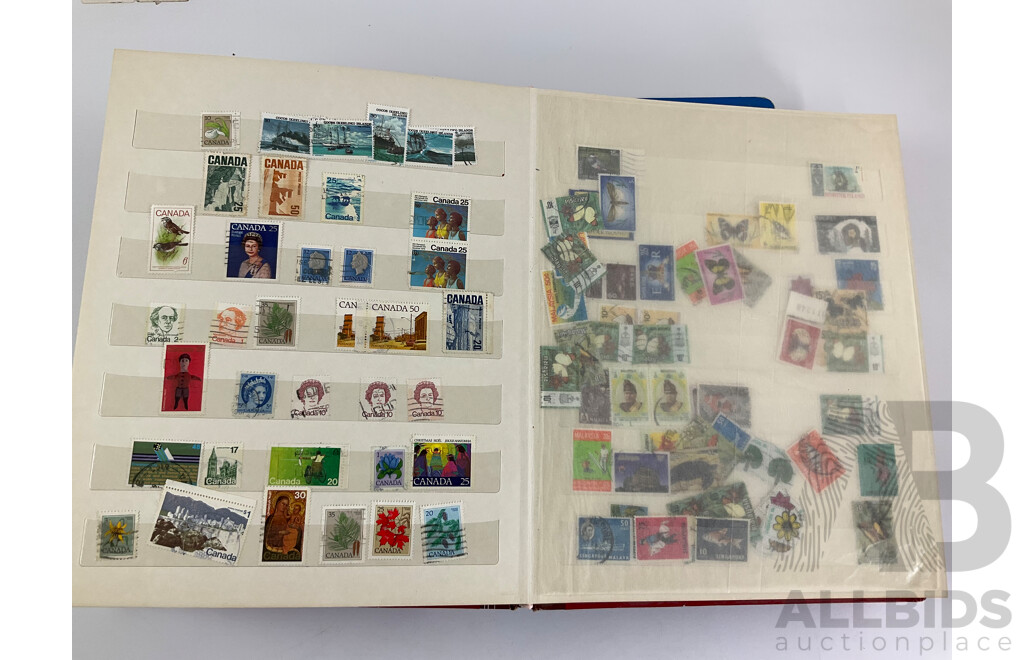 Two Albums of Vintage Stamps Including New Zealand, Dubai, Mongolia, Poland, Cocos Islands, Zimbabwe, Singapore, Canada, Yugoslavia, USA, Netherlands, UK, Fiji, France, PNG, Grenada, Isle of Men