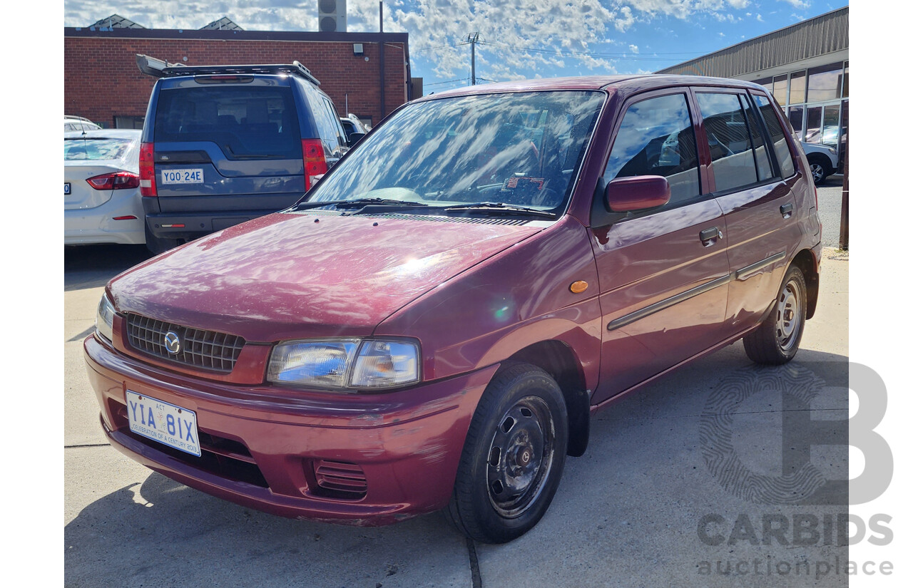 6/1998 Mazda 121 Metro  5d Hatchback Maroon 1.3L