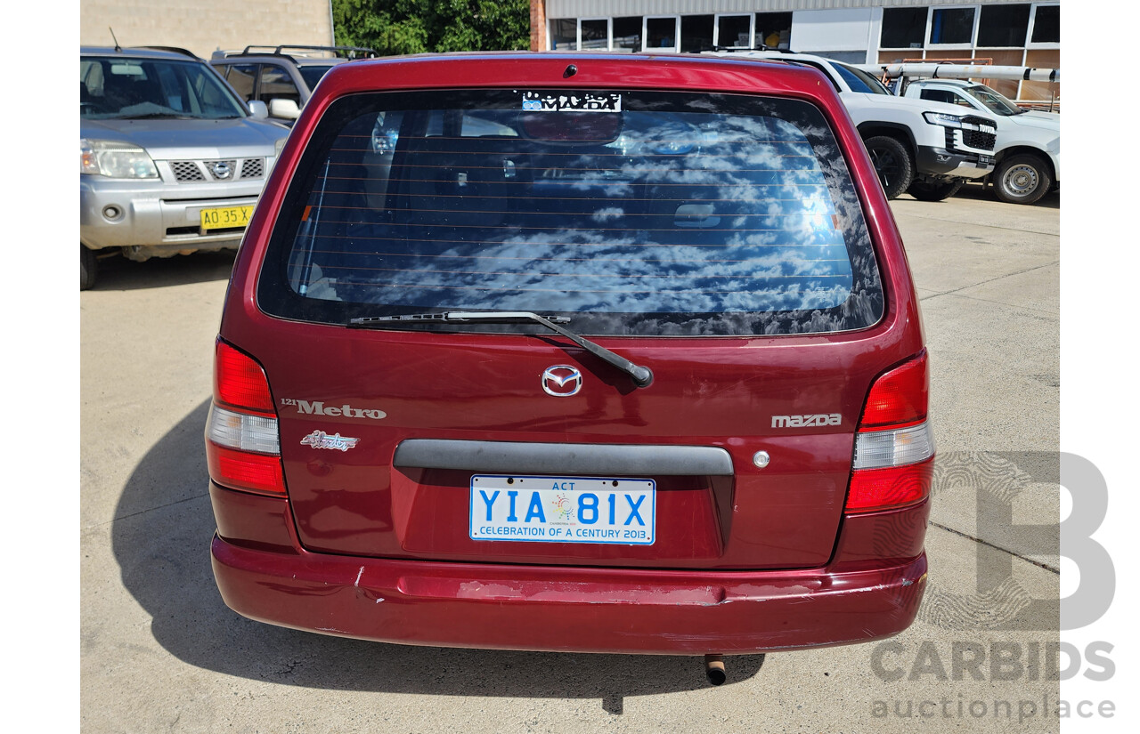 6/1998 Mazda 121 Metro  5d Hatchback Maroon 1.3L