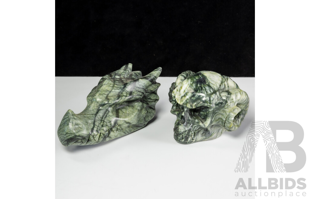 Carved Green Soft Stone Horned Deaths Head Bust Along with Carved Green Soft Stone Dragon Skull Figure