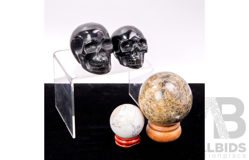 Collection Carved Polished Stone Pieces Including Two Memento Mori Black Skulls & Two Spheres with Wooden Stands